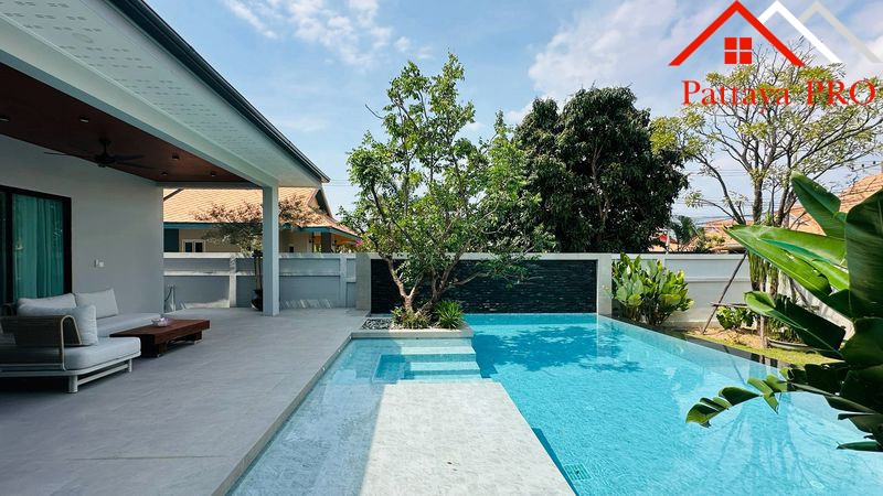 A beautifully renovated modern home inspired by the concept of **Less is More**