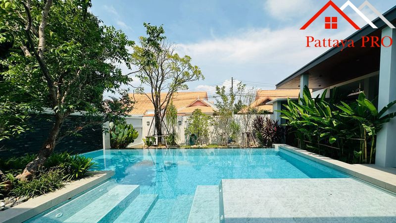A beautifully renovated modern home inspired by the concept of **Less is More**