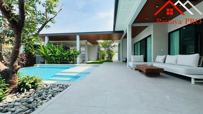 A beautifully renovated modern home inspired by the concept of **Less is More**